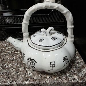 Artistic White Ceramic Teapot with Black Detailing